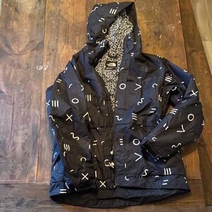 The North Face Black Jacket with White Symbols